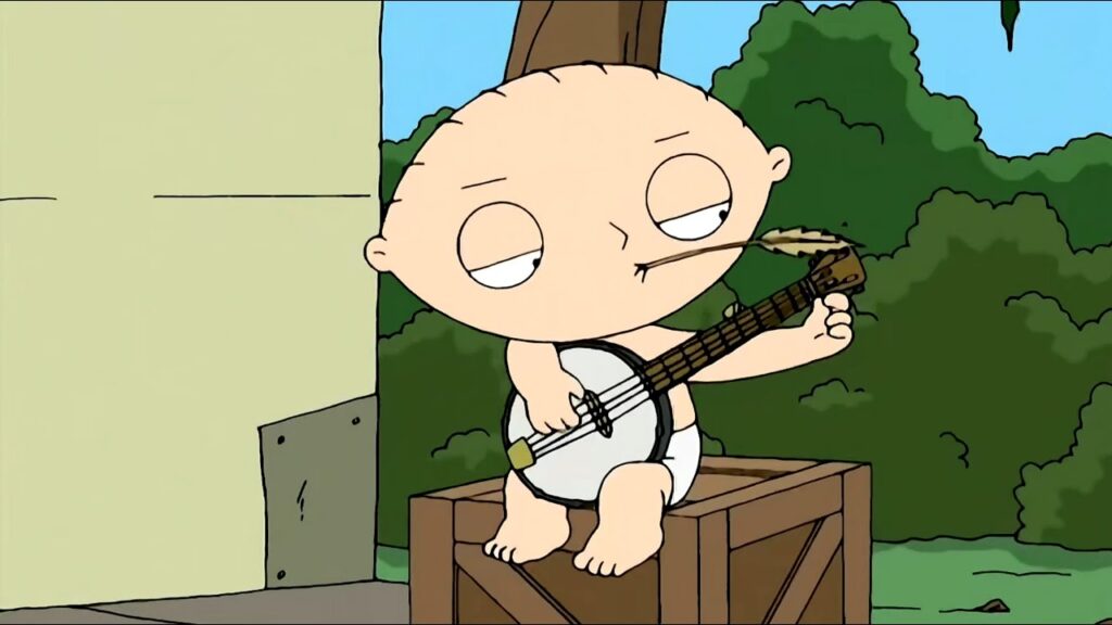 Stewie, an animated white young boy, is holding a banjo with wheat in his mouth.