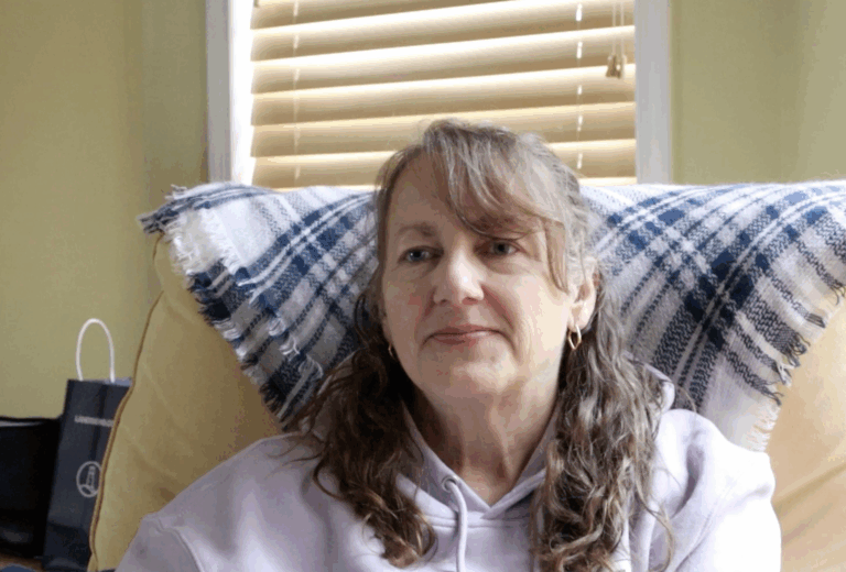 Ms. Phelps in a comfy chair.